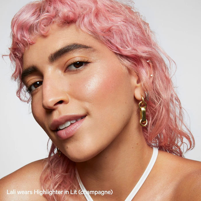 Pre orden - MILK MAKEUP
Dewy Cream Highlighter Stick in Lit - champagne pearl